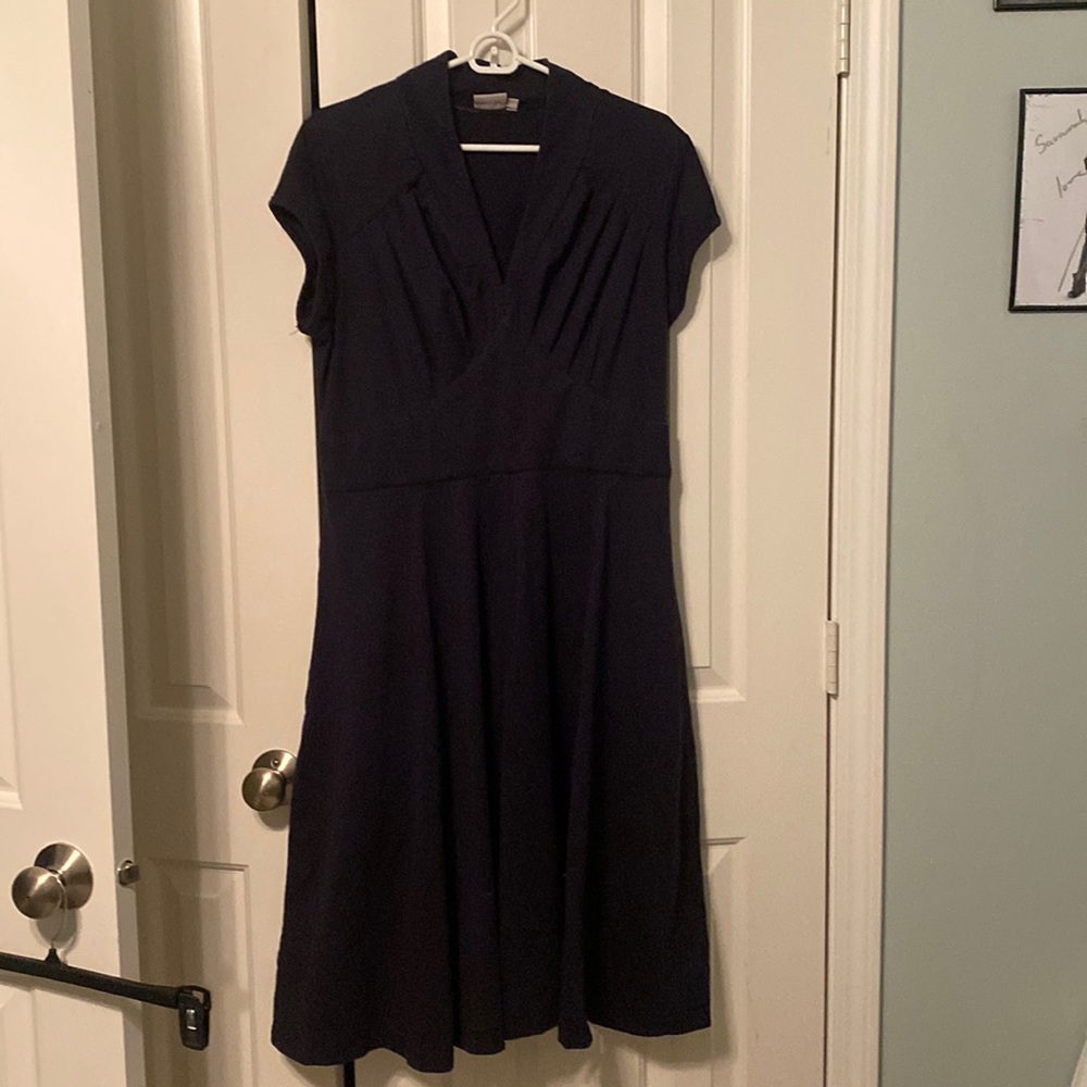 Black v neck worn pockets